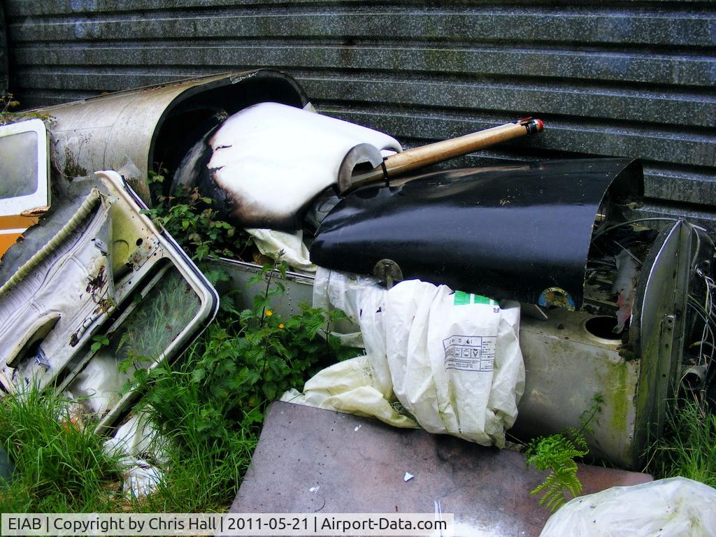 EIAB Airport - unknown airframe in the bone yard behind the hangars at Abbeyshrule Airport, Ireland