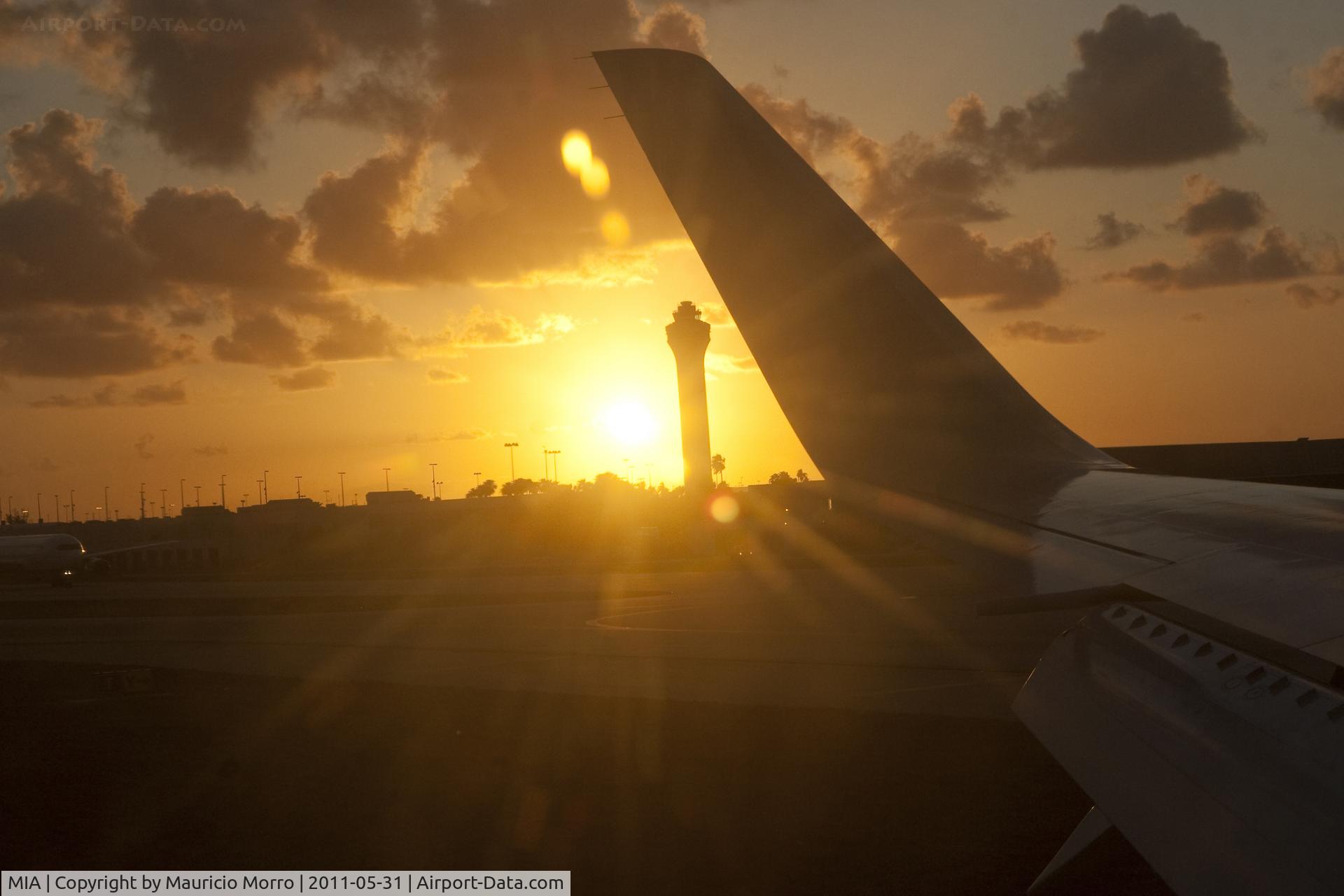 Miami International Airport (MIA) - The sun sets at MIA (from a 767)