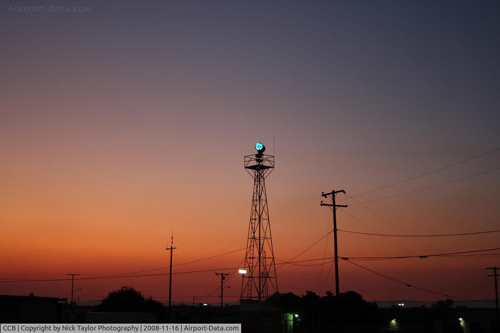Cable Airport (CCB) - Taken just before sunrise as the Yorba Linda hills burned to the South giving the sky an eerie orange glow.