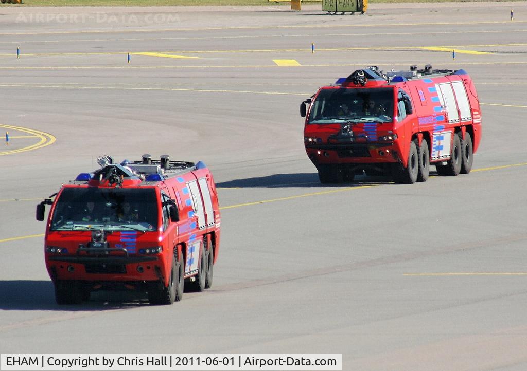 Amsterdam Schiphol Airport, Haarlemmermeer, near Amsterdam Netherlands (EHAM) - Fire Trucks at Schiphol