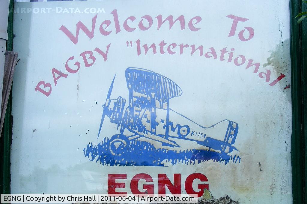 EGNG Airport - in the window of the clubhouse at Bagby airfield