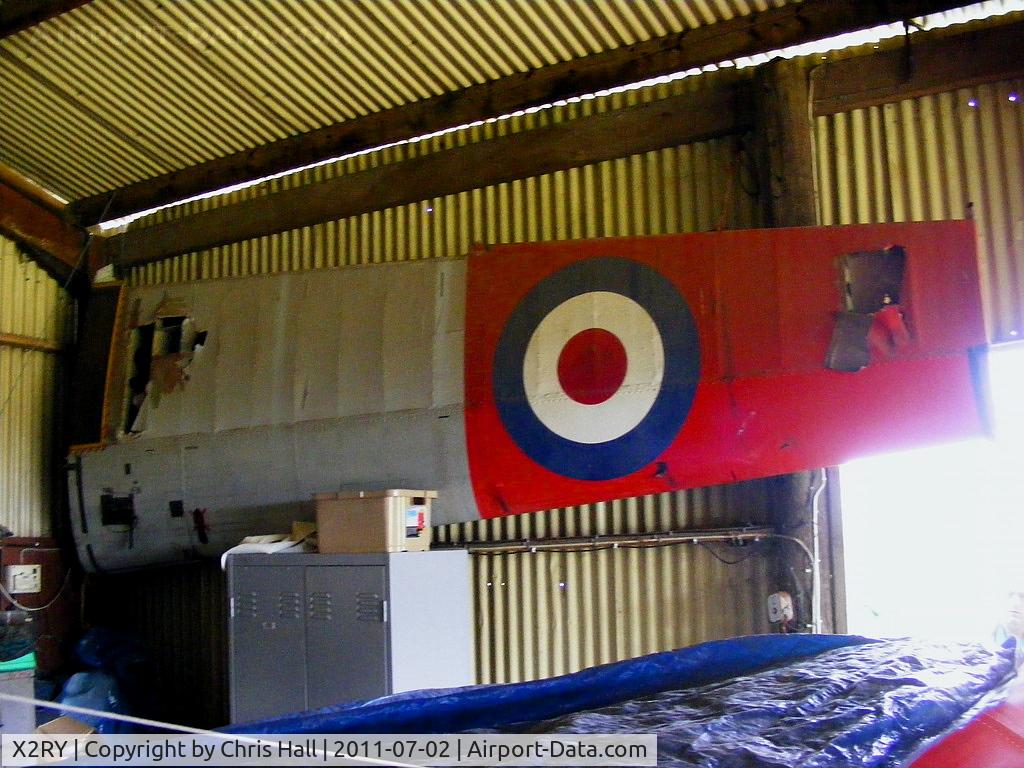 X2RY Airport - DHC Chipmunk wing in the hangar at Rayne Hall Farm