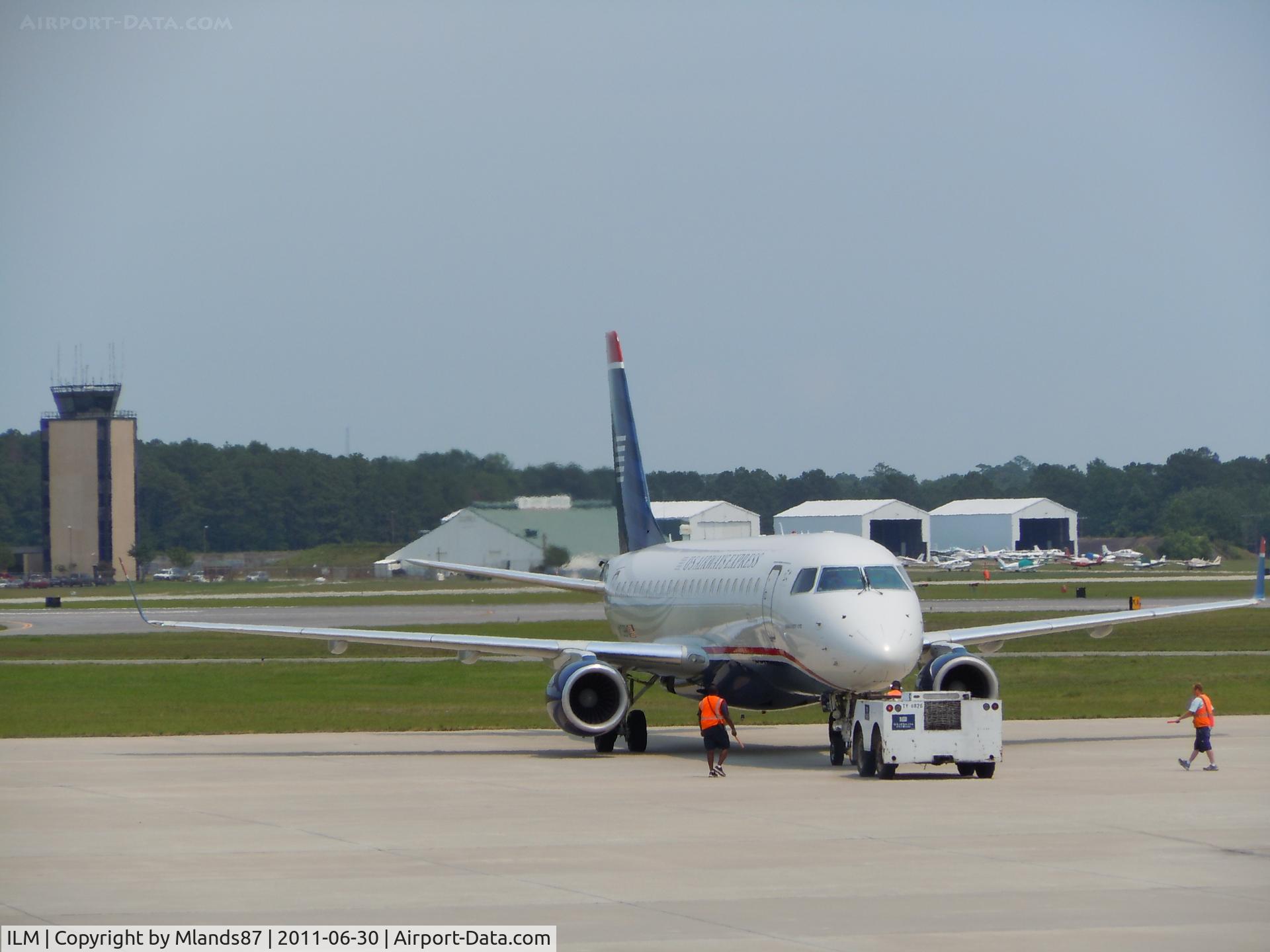 Wilmington International Airport (ILM) - A United Airlines Embraer ERJ170 unhooking from the pushback.