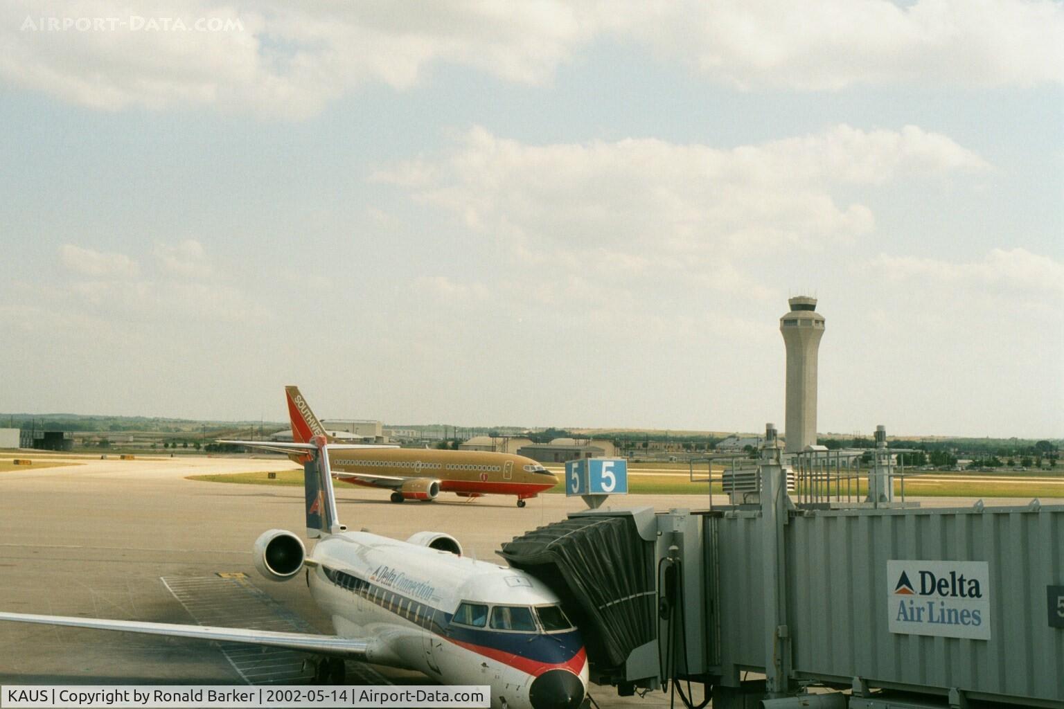 Austin-bergstrom International Airport (AUS) - South West taxiing, Delta at the gate