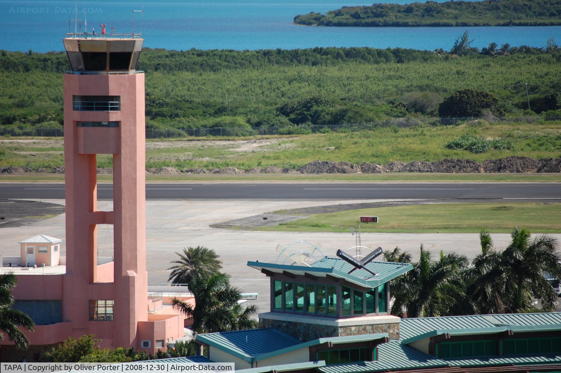 VC Bird International Airport, Saint John's, Antigua Antigua and Barbuda (TAPA) - V.C. Bird Tower next to the top of the Sticky Wicket Restaurant and Pitch. Taken from the Stanford Antigua Observation Tower