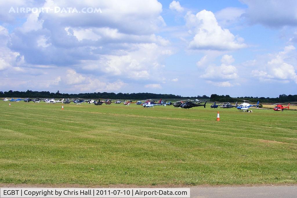 Turweston Aerodrome Airport, Turweston, England United Kingdom (EGBT) - Sixty helicopters at Turweston used for ferrying race fans to Silverstone for the British F1 Grand Prix