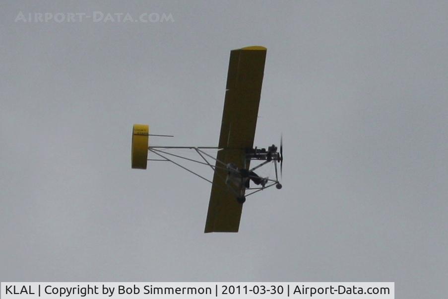 Lakeland Linder Regional Airport (LAL) - Ultralight with a tube-shaped tail overflying Sun N Fun 2011.  It must be stable handling because it was too gusty for the air show!