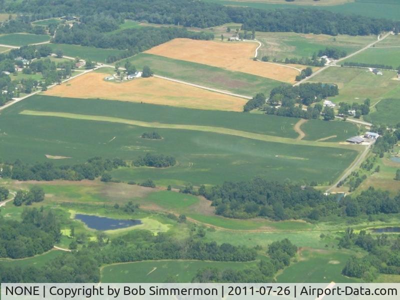 NONE Airport - E-W farm strip about 2 miles NW of Churubusco, IN on US 33.
