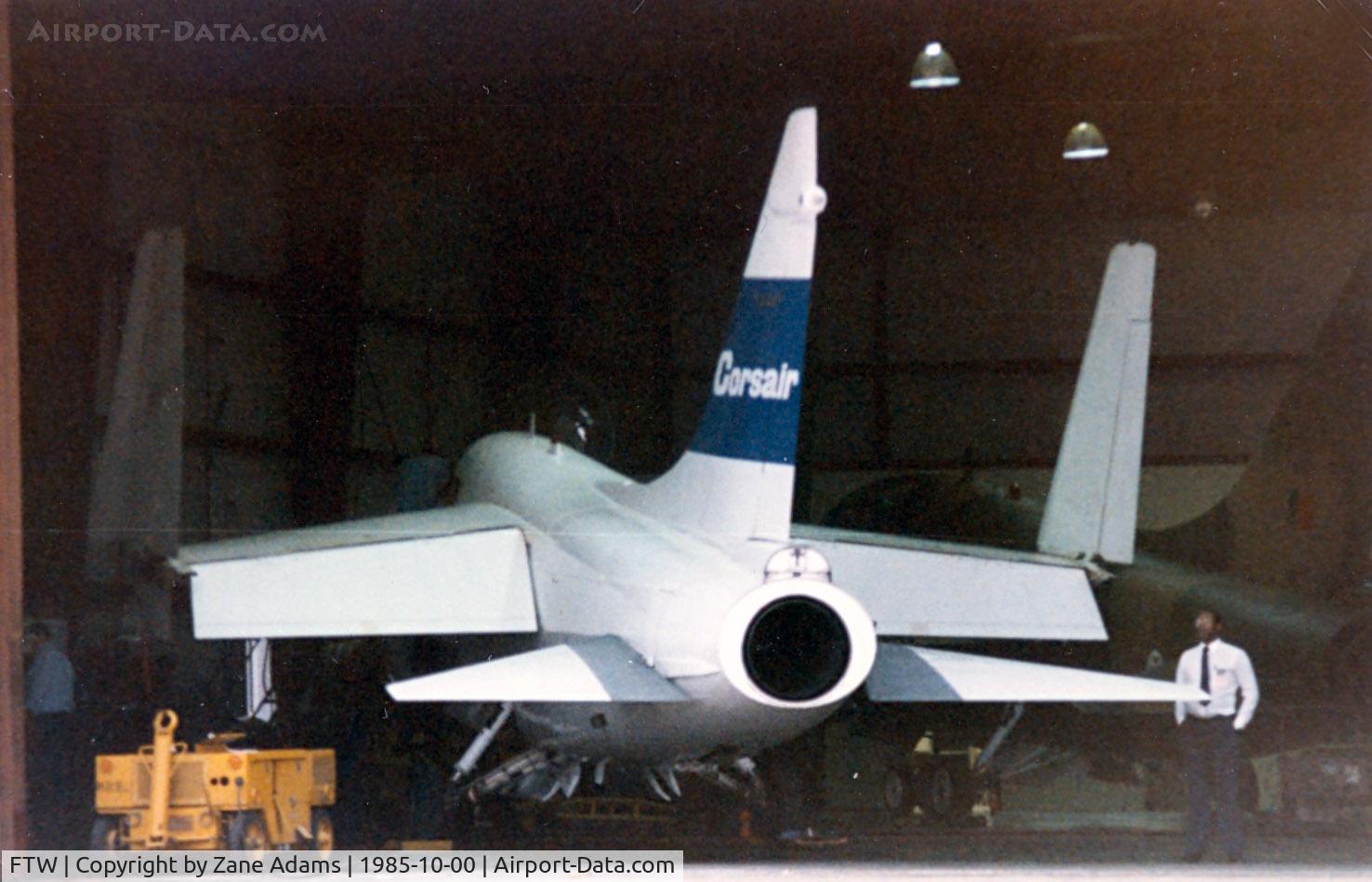 Fort Worth Meacham International Airport (FTW) - A-7 CorsairII in a hanger at Meacham Field ....notice an second in camoflague paint inside the hanger