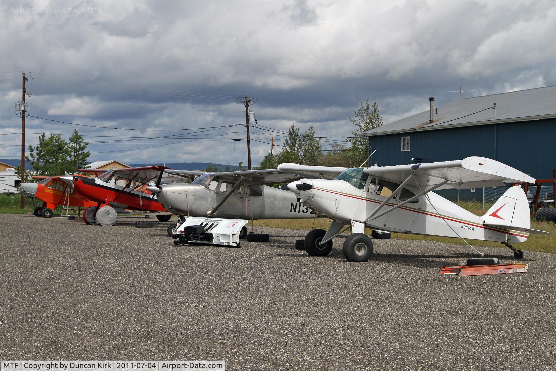 Metro Fld Airport (MTF) - A snow plough, older aircraft, tundra tires, and everyone has a plane. Welcome to one of Fairbanks many airports!!!