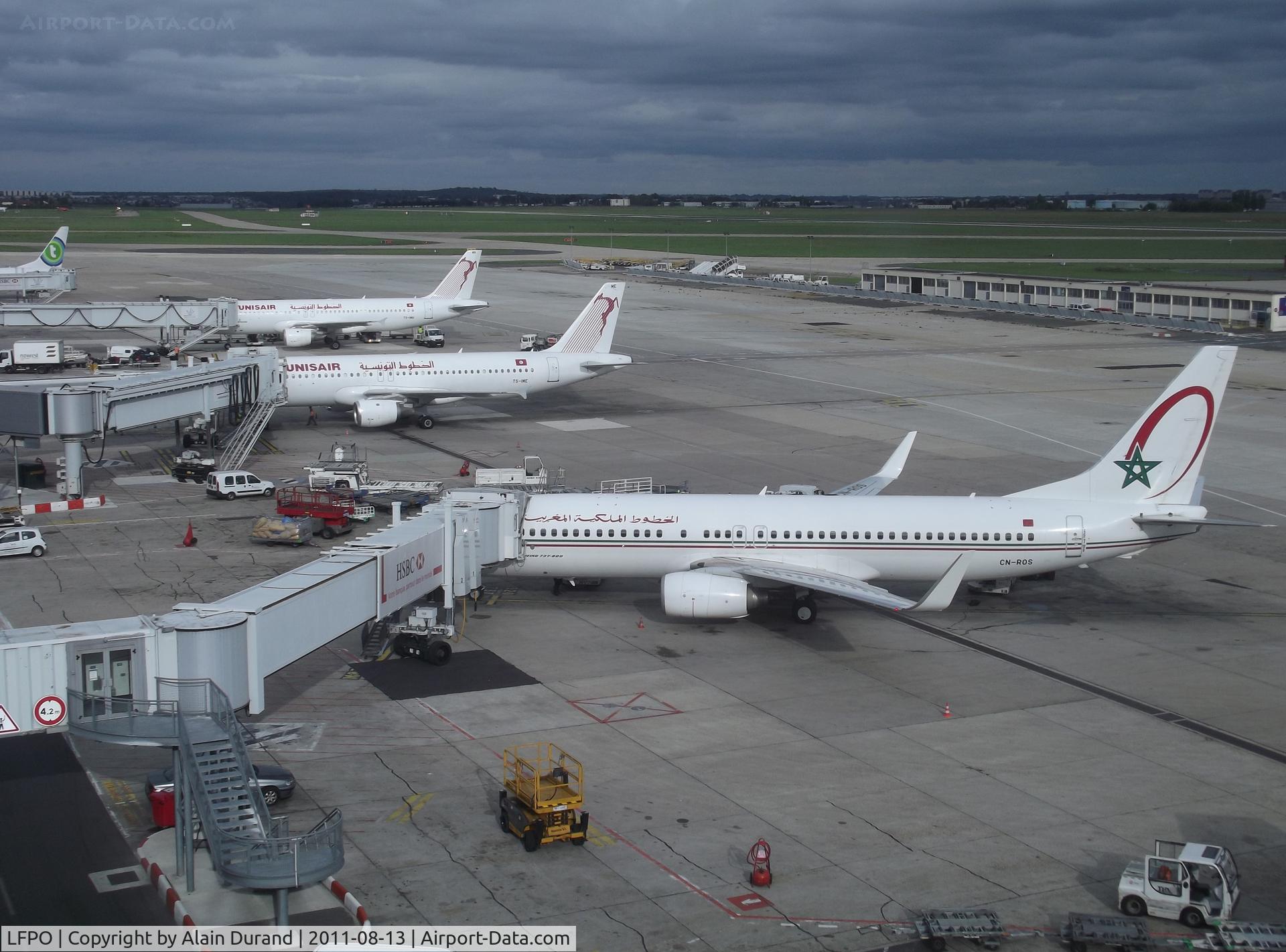Paris Orly Airport, Orly (near Paris) France (LFPO) - Royal Air Maroc 737-8B6(W) CN-ROS was being set for her next sector to Casablanca, Tunisair A320-214 TS-IME had just docked while arriving from Tunis as TU 722, sister-ship IMN was being set for Djerba and Transavia 737-800 was set for a red-eye return to