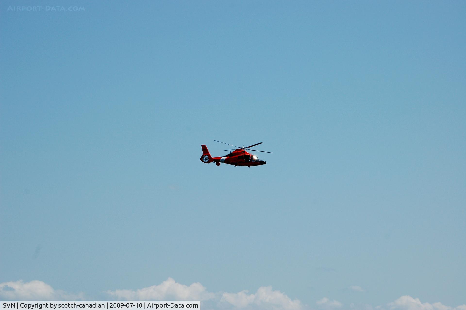 Hunter Aaf Airport (SVN) - US Coast Guard Eurocopter HH-65 Dolphin Helicopter over Charleston Harbor, SC. This aircraft is based at Coast Guard Air Station (Hunter AAF), Savannah, GA 