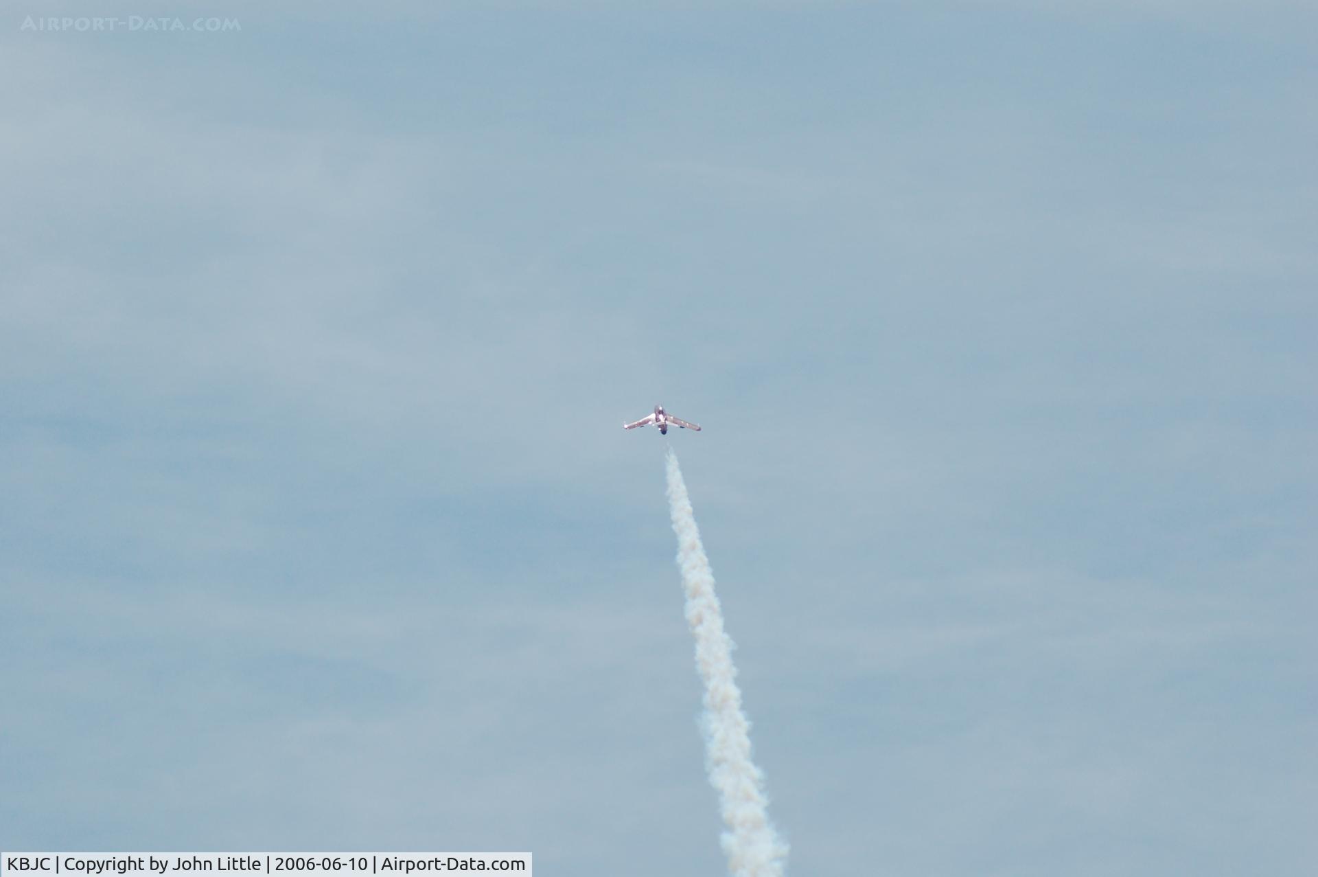 Rocky Mountain Metropolitan Airport (BJC) - Shot at full 750MM. Mig Up at 54 degrees and outbound