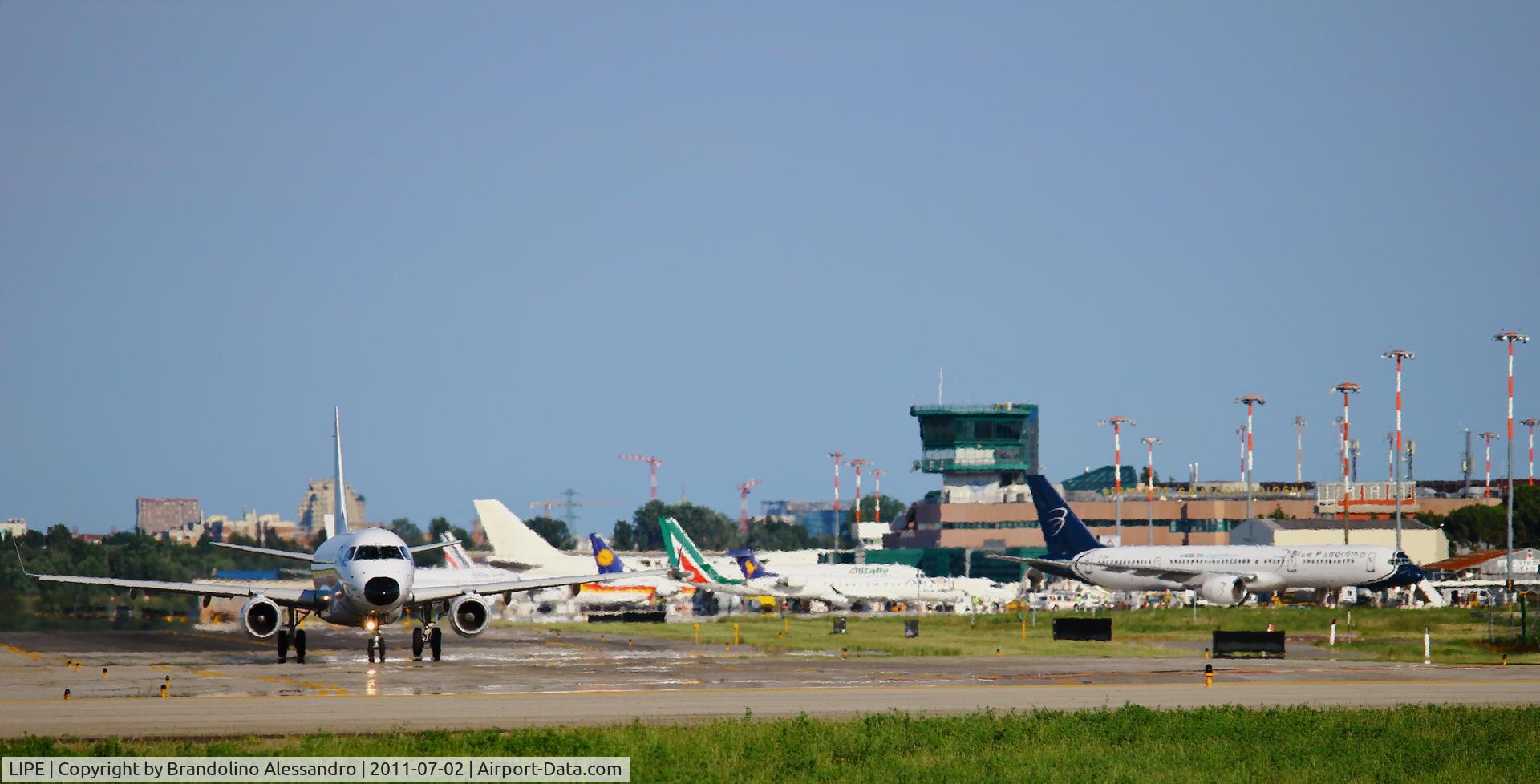 Bologna Airport (Guglielmo Marconi Airport), Bologna Italy (LIPE) - Taxiing with terminal in the Background