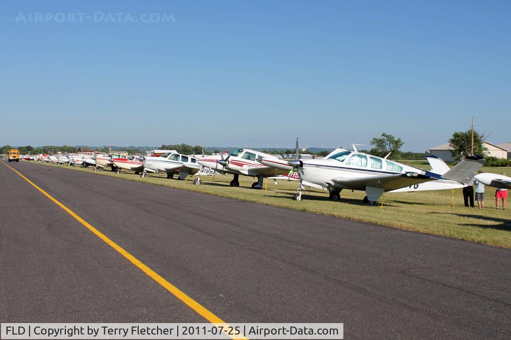 Fond Du Lac County Airport (FLD) - Visitors at Fond Du Lac during 2011 Oshkosh Week -
a FREE bus is available to pilots AND enthusiasts during this week