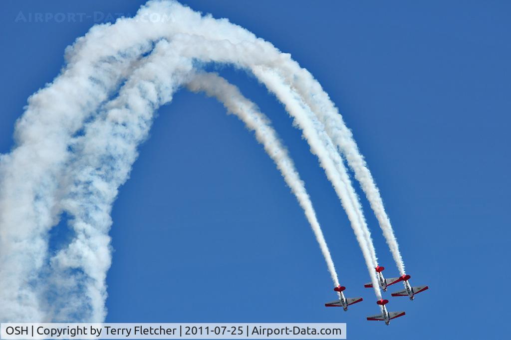 Wittman Regional Airport (OSH) - The Aeroshell Display team in action at 2011 Oshkosh