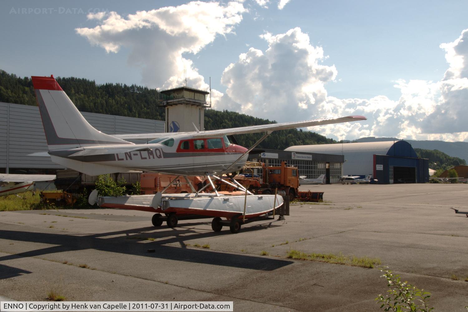 Notodden Airport, Tuven,, Notodden Norway (ENNO) - Overview of the platform and hangars with Cessna U206E floatplane LN-LMQ.