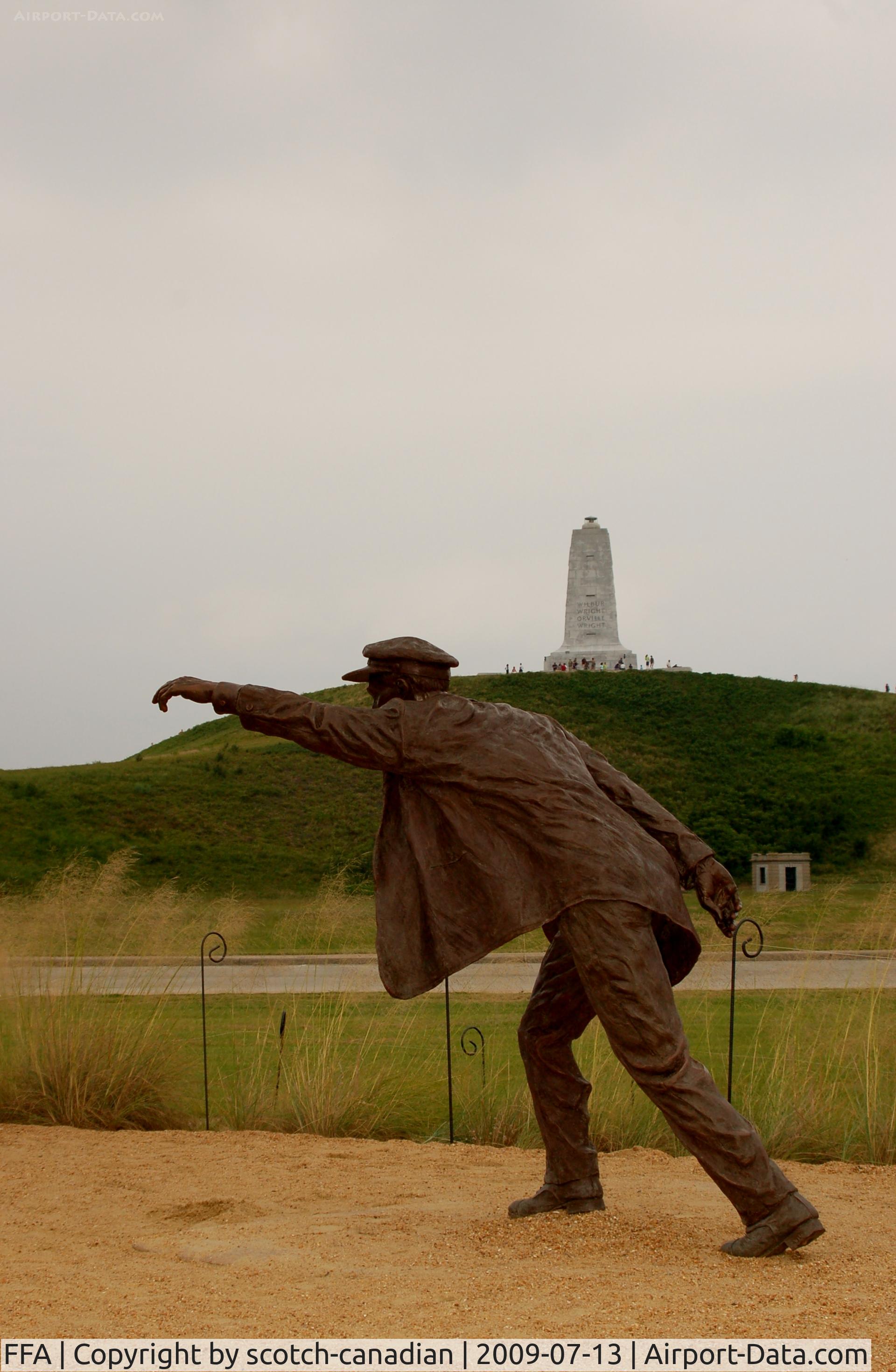 First Flight Airport (FFA) - Sculpture of Wilber Wright at the 1903 Wright Flyer Sculpture at the Wright Brothers National Memorial, Kill Devil Hills, NC