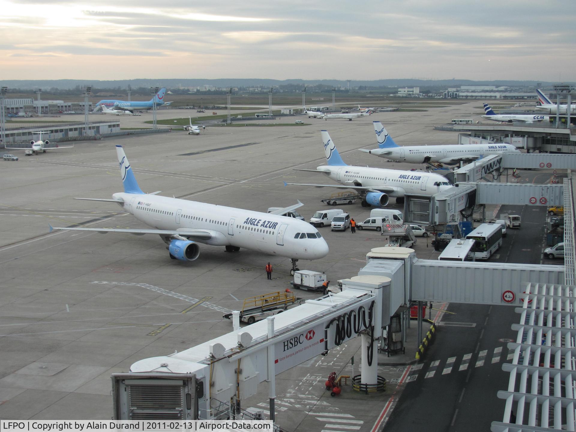Paris Orly Airport, Orly (near Paris) France (LFPO) - Three Aigle Azur fleet members at gates. Those gates are linked to the European borderless sector of South Terminal.