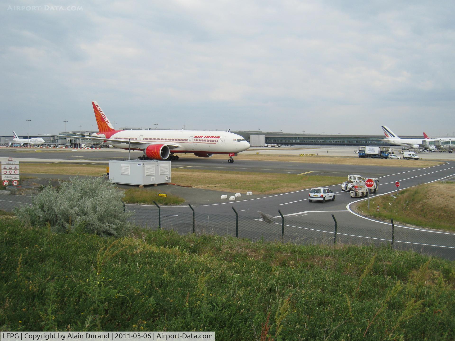 Paris Charles de Gaulle Airport (Roissy Airport), Paris France (LFPG) - Part view of Terminal 2F, despite looking so, Air India 772 was not departing