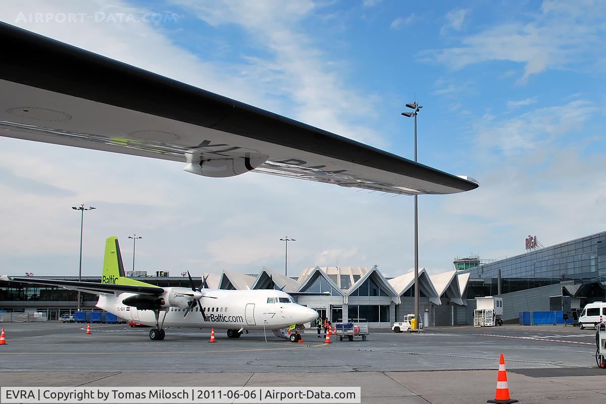 R?ga International Airport, R?ga Latvia (EVRA) - Air Baltic's fleet is dominating at RIX.