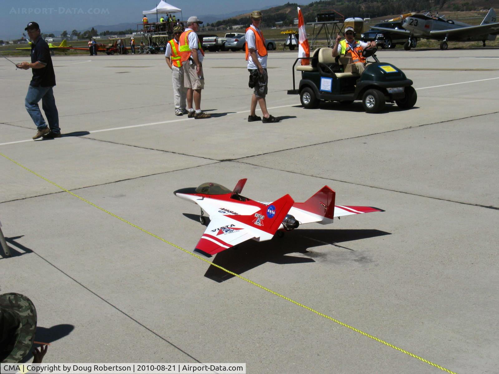 Camarillo Airport (CMA) - NASA/Vista Ford RC JET, taxi demo past crowd after landing-very fast flyer with six minute fuel supply and expert controller on far left
