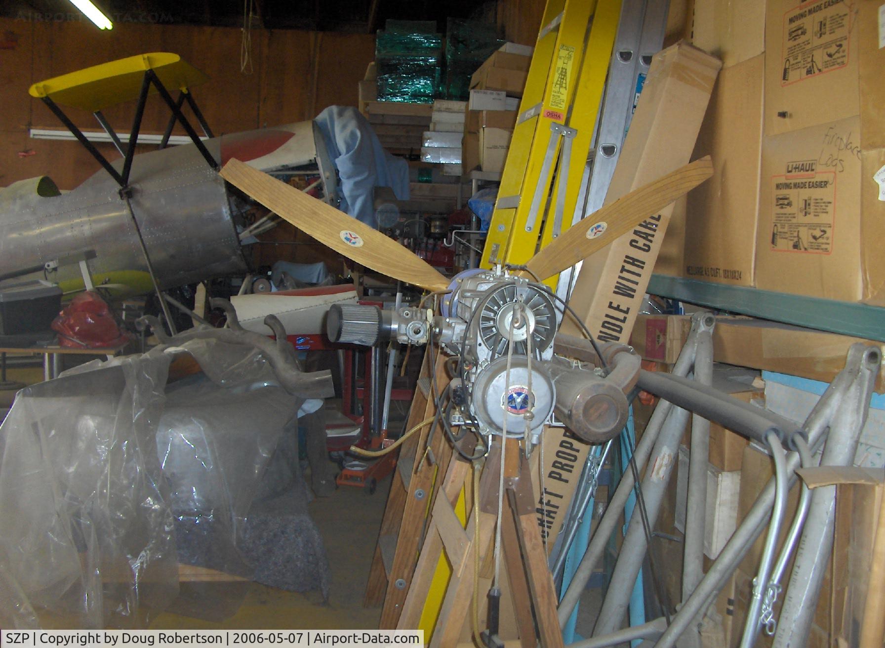 Santa Paula Airport (SZP) - Cuyuna 35 Hp water-cooled two cylinder single ignition engine, rear view, age unknown, three blade prop. Note: N34301, 1941 Meyers OTW 145 behind