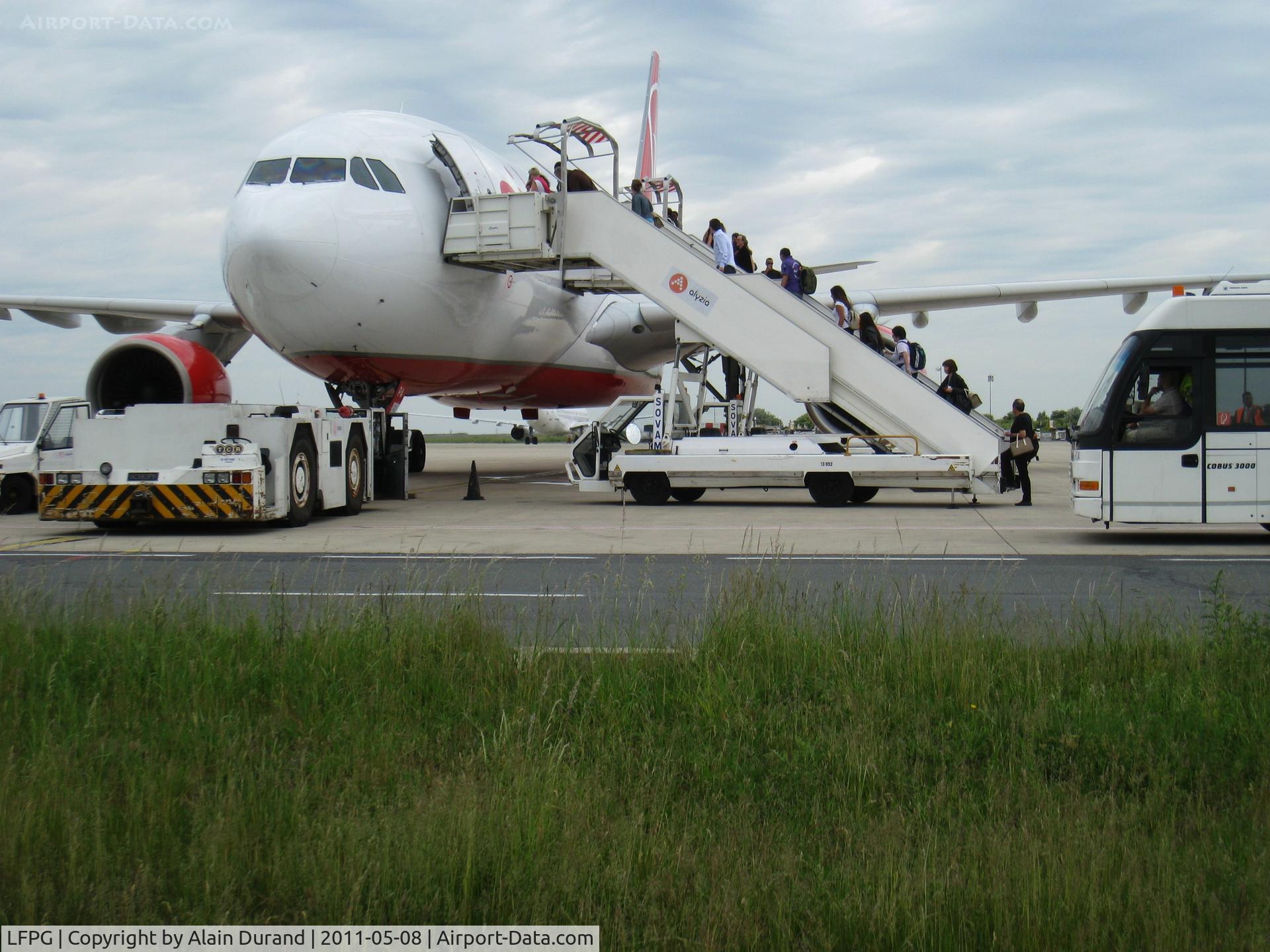 Paris Charles de Gaulle Airport (Roissy Airport), Paris France (LFPG) - Although the flight was not listed, quiet a few passengers lined up the stairs to Air Berlin A330-200 D-ALPA