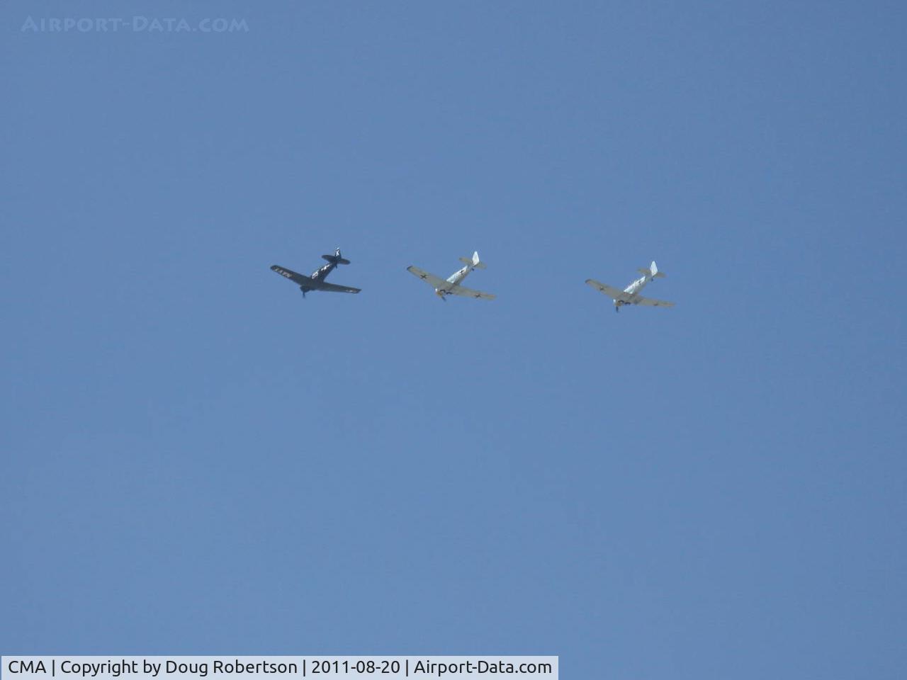 Camarillo Airport (CMA) - Three North American AT-6s in formation flight-2011 'Wings Over Camarillo' Airshow. The two light colored aircraft are from The Condor Squadron