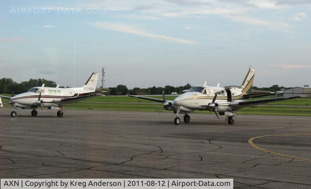 Chandler Field Airport (AXN) - A pair of Bemidji Aviation Queen Airs on a Friday night.
