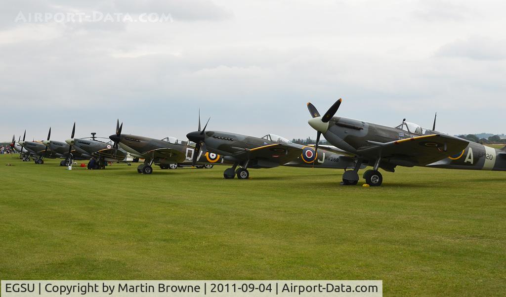 Duxford Airport, Cambridge, England United Kingdom (EGSU) - THE FLIGHT LINE AT THE 75TH ANNIVERSARY OF THE SPITFIRE AIRSHOW.
