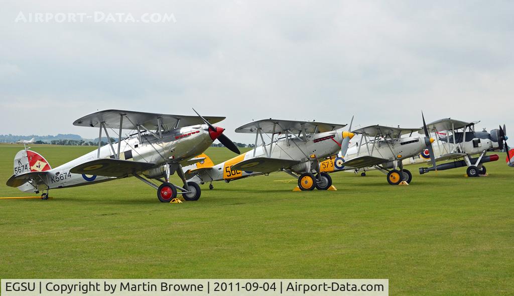 Duxford Airport, Cambridge, England United Kingdom (EGSU) - PART OF THE FLIGHTLINE AT THE 75TH ANNIVERSARY OF THE SPITFIRE AIRSHOW.