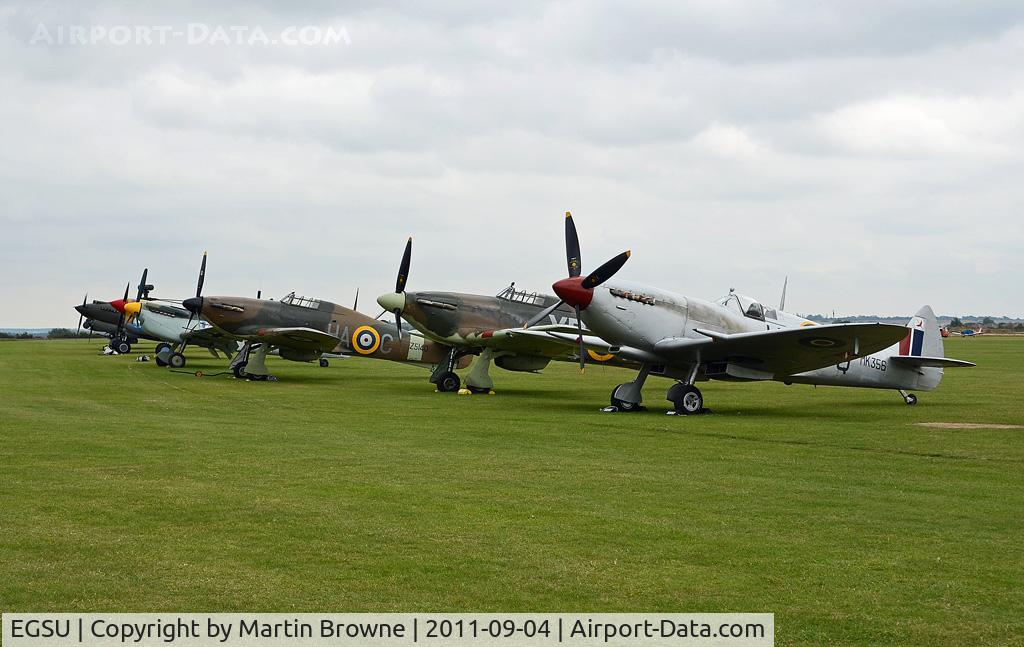 Duxford Airport, Cambridge, England United Kingdom (EGSU) - PART OF THE FLIGHT LINE AT DUXFORD ON A VERY DULL AND RAINY DAY.