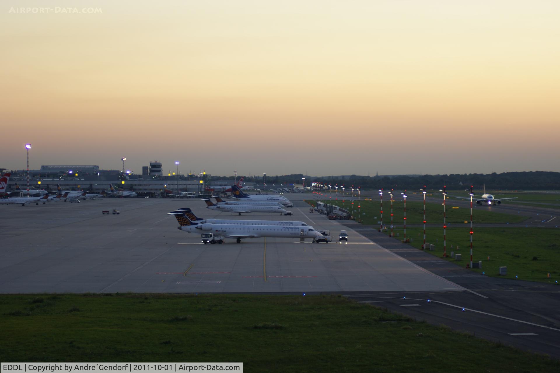 Düsseldorf International Airport, Düsseldorf Germany (EDDL) - EDDL / DUS seen from the visitors platform at the railway-station of the airport at dusk