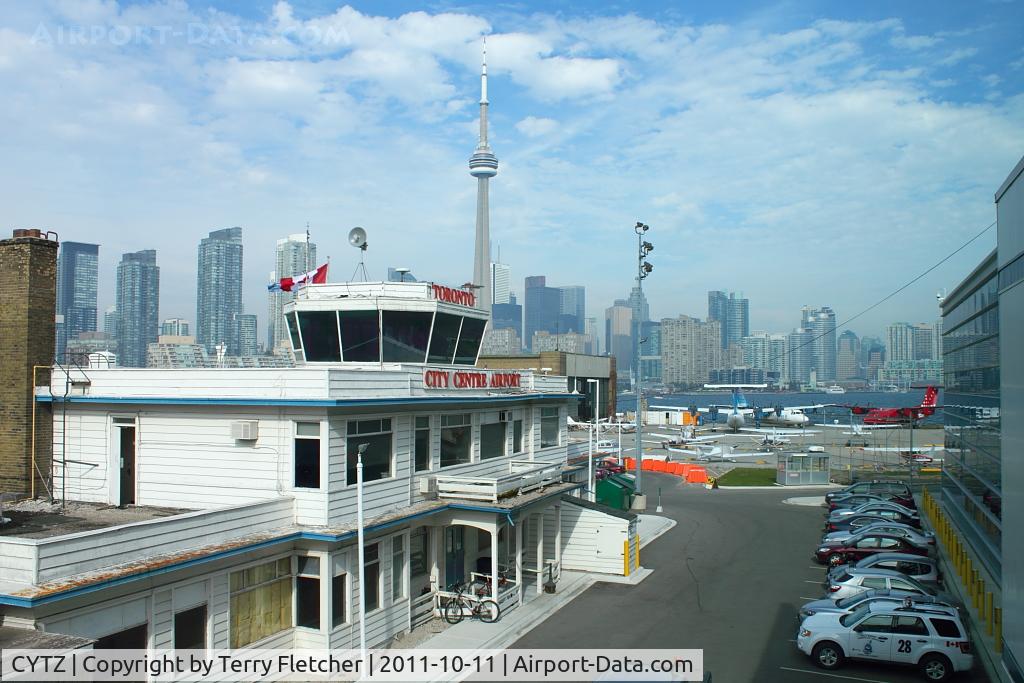 Toronto City Centre Airport, Toronto, Ontario Canada (CYTZ) - Nice to see that amongst all the new developments at Toronto City Centre Airport that the old Terminal has been retained , even if dwarfed by the new buildings