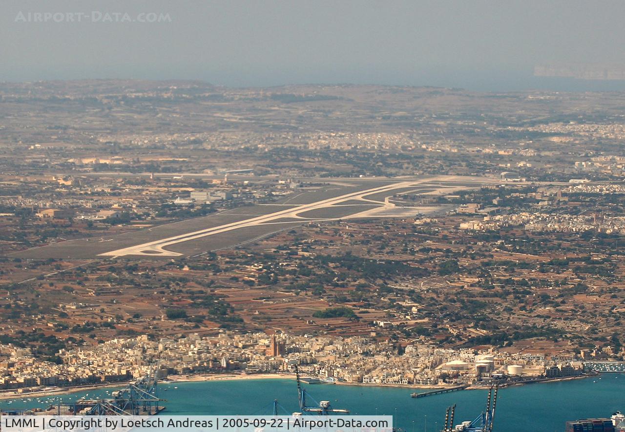 Malta International Airport (Luqa Airport), Luqa Malta (LMML) - Malta Freeport and the nice Town Birzebbuga, we are one right base for RWY31 to Luqa Airport