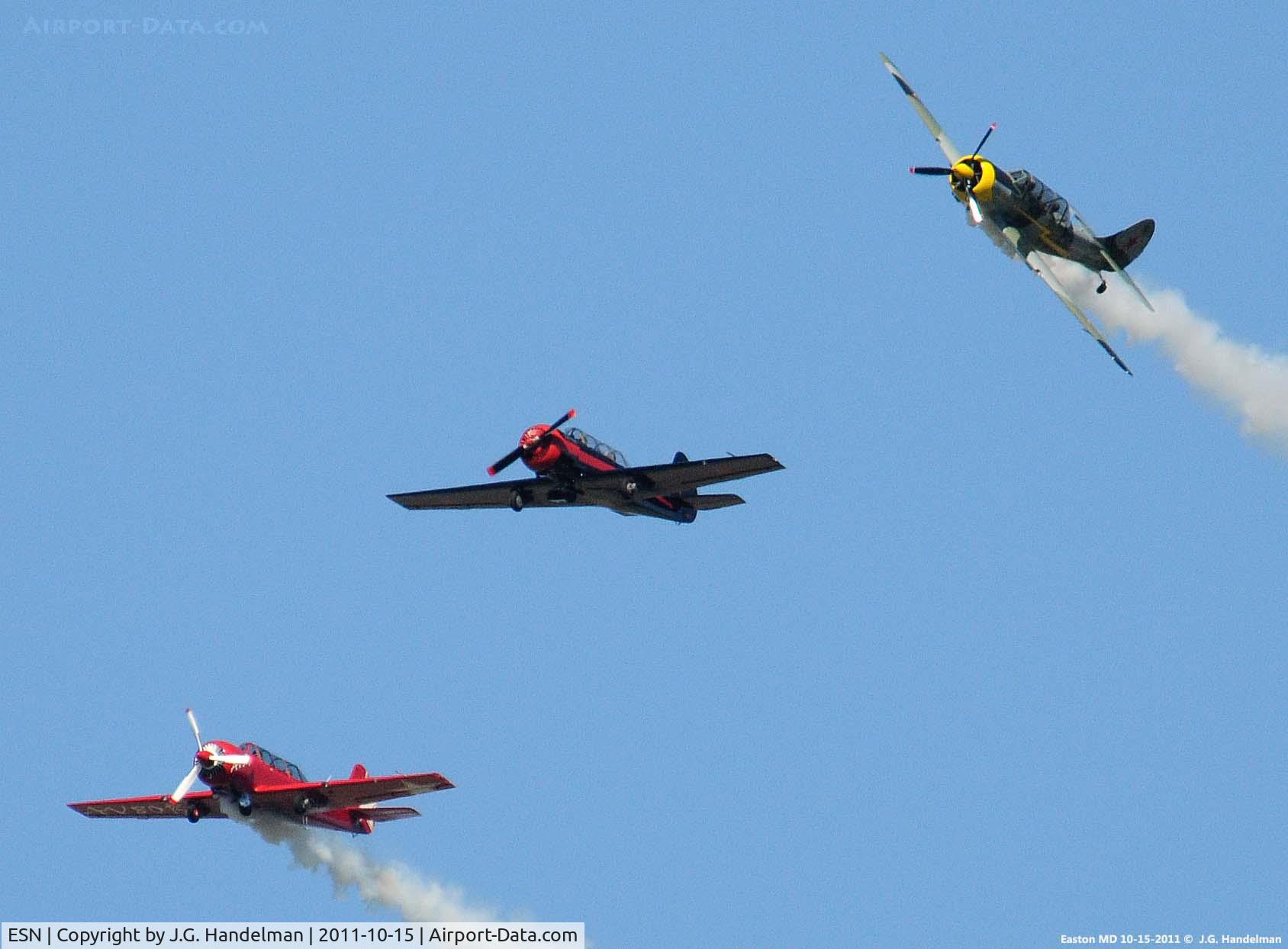 Easton/newnam Field Airport (ESN) - Yak-52s breaking over Easton MD