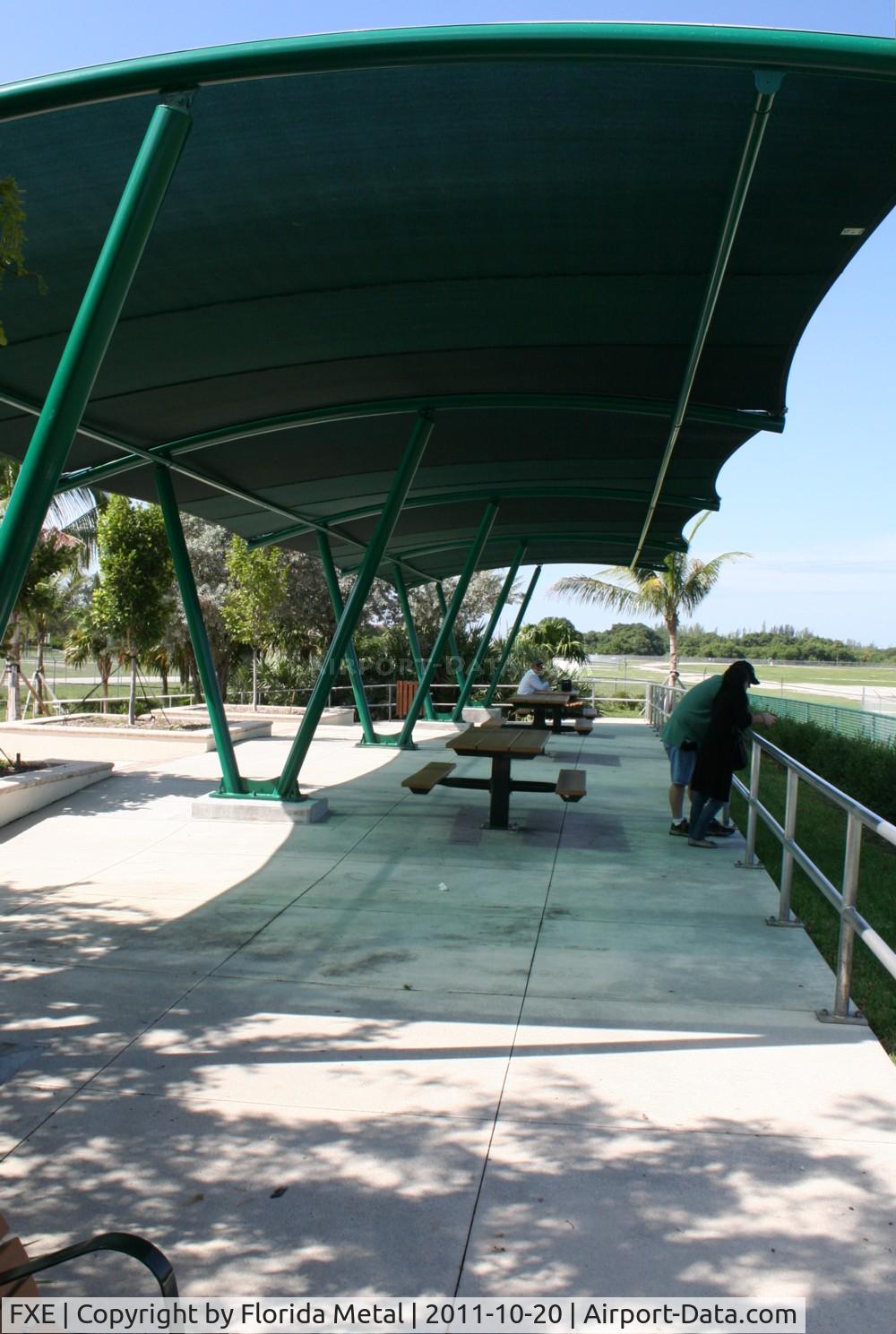 Fort Lauderdale Executive Airport (FXE) - Spotting area at Ft. Lauderdale Executive with benches, tables and tower broadcasts