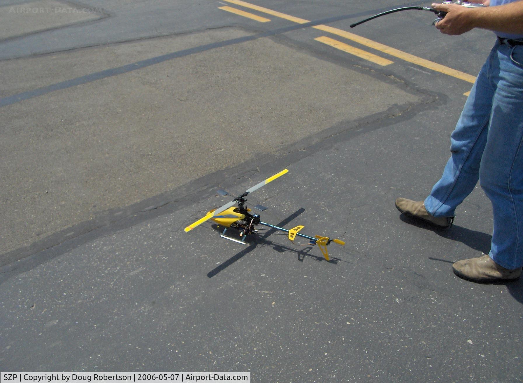 Santa Paula Airport (SZP) - T-REX radio-controlled helicopter, electric motor start and pre-takeoff