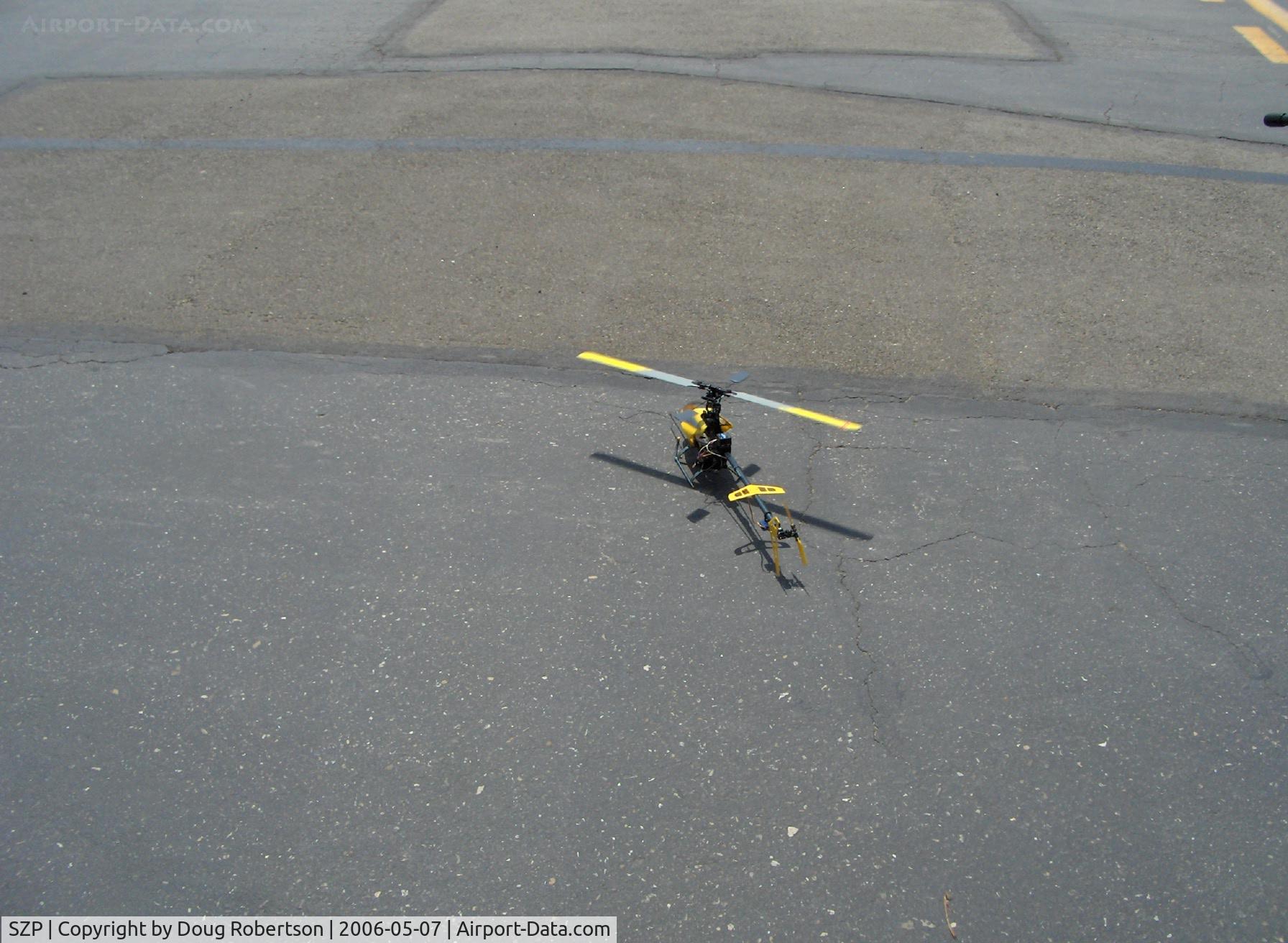 Santa Paula Airport (SZP) - T-REX radio-controlled  helicopter, building rotor revs for takeoff