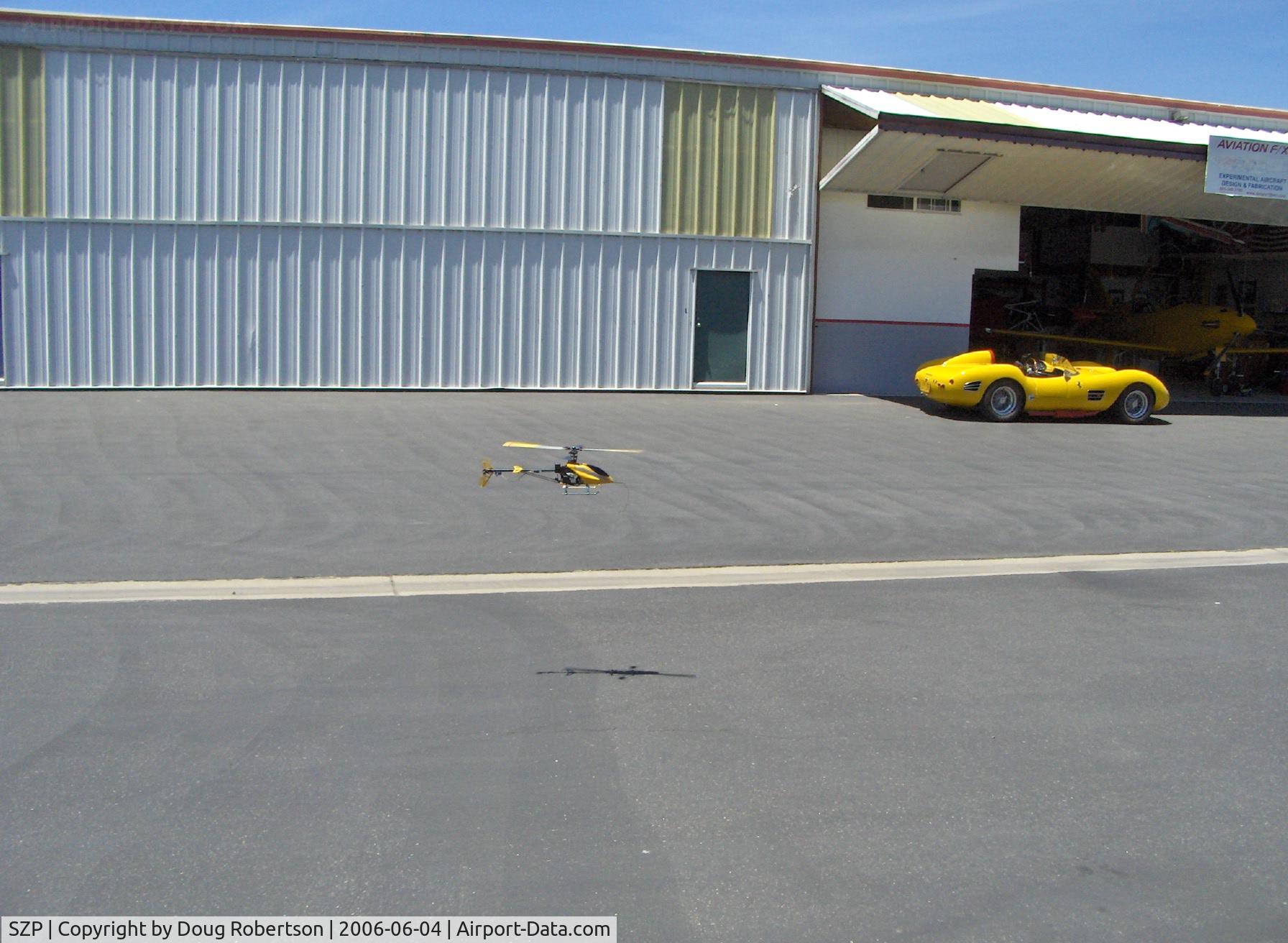 Santa Paula Airport (SZP) - T-REX radio-controlled helicopter, in flight (chasing the Ferrari?)