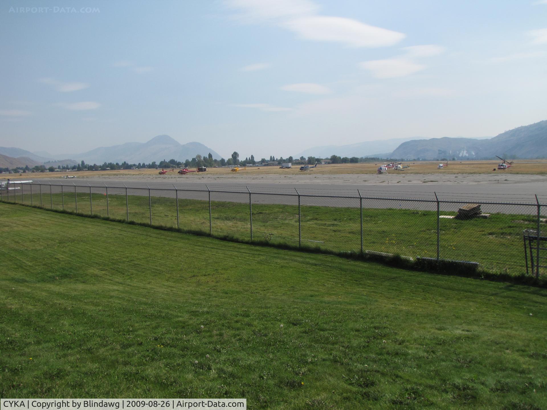 Kamloops Airport, Kamloops, British Columbia Canada (CYKA) - ..There are 9 helicopters in this shot and another 9 that aren't. ( you couldn't swing a dead cat without hitting one.   BAD fire season.)