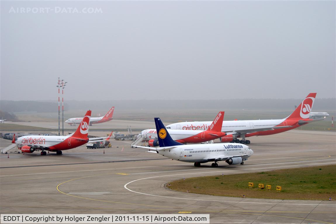 Tegel International Airport (closing in 2011), Berlin Germany (EDDT) - Resting and rolling aircrafts in a foggy environment.