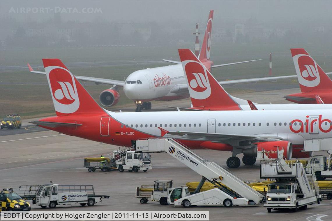 Tegel International Airport (closing in 2011), Berlin Germany (EDDT) - A big bug is crawling out of the fog.........