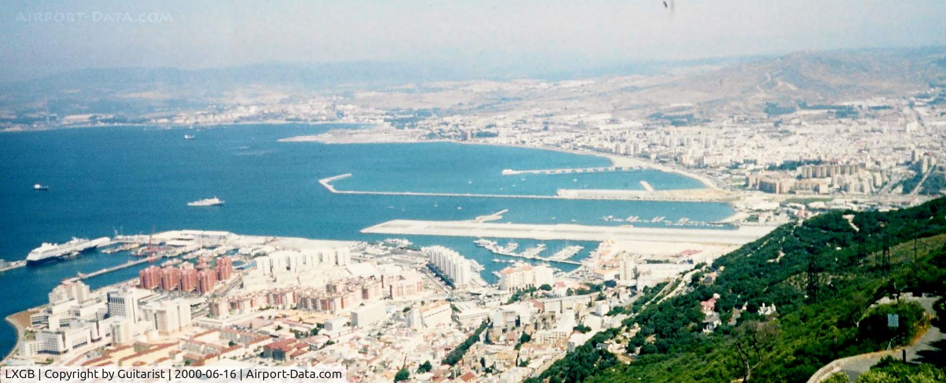 Gibraltar Airport, Gibraltar Gibraltar (LXGB) - Taken while being harassed by a Barbary ape