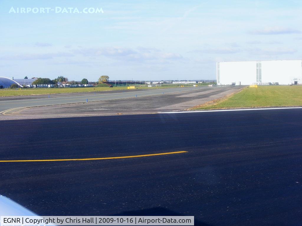 Hawarden Airport, Chester, England United Kingdom (EGNR) - view down taxyway Delta and the A380 factory