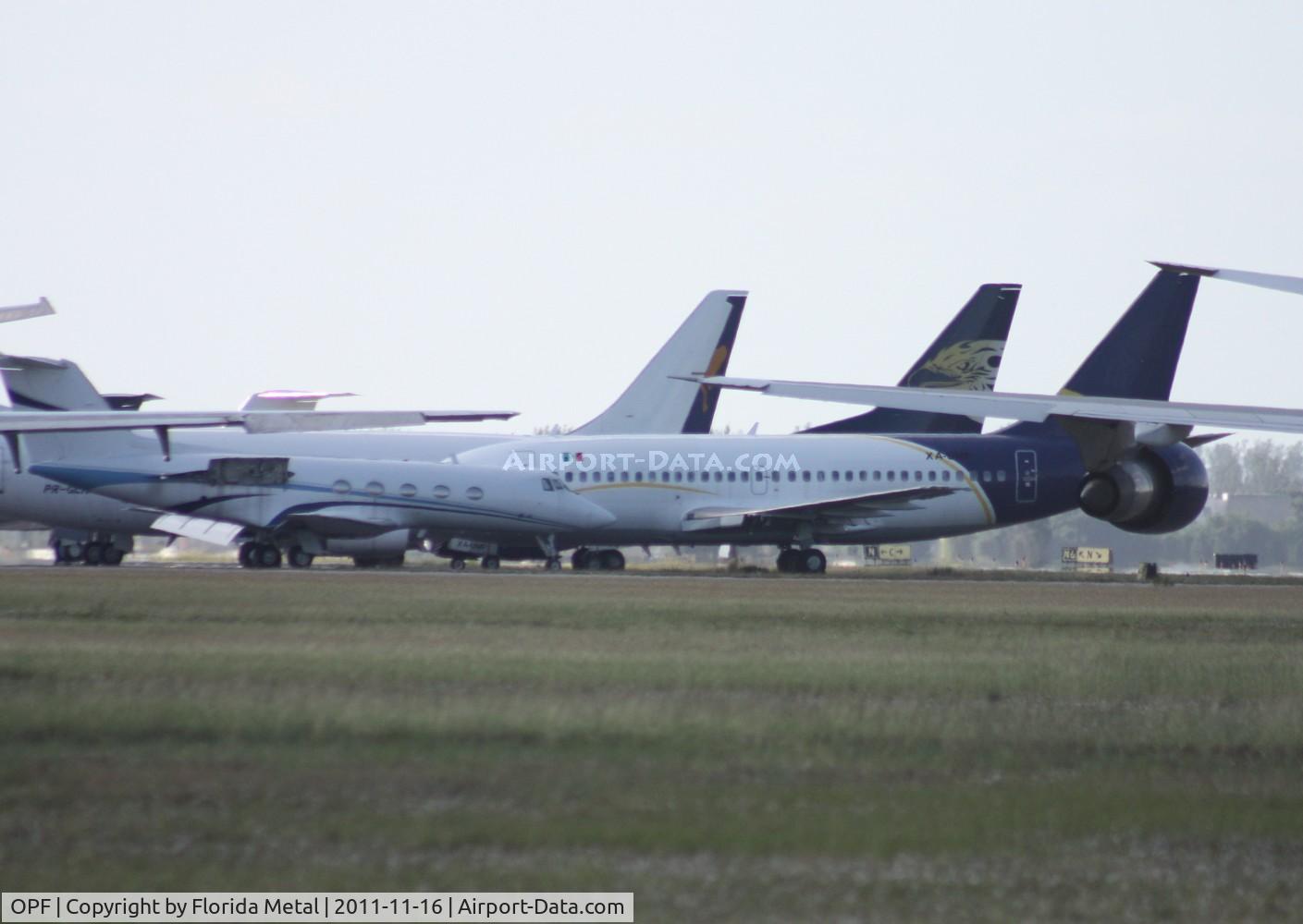 Opa-locka Executive Airport (OPF) - a few of the planes parked at Opa Locka