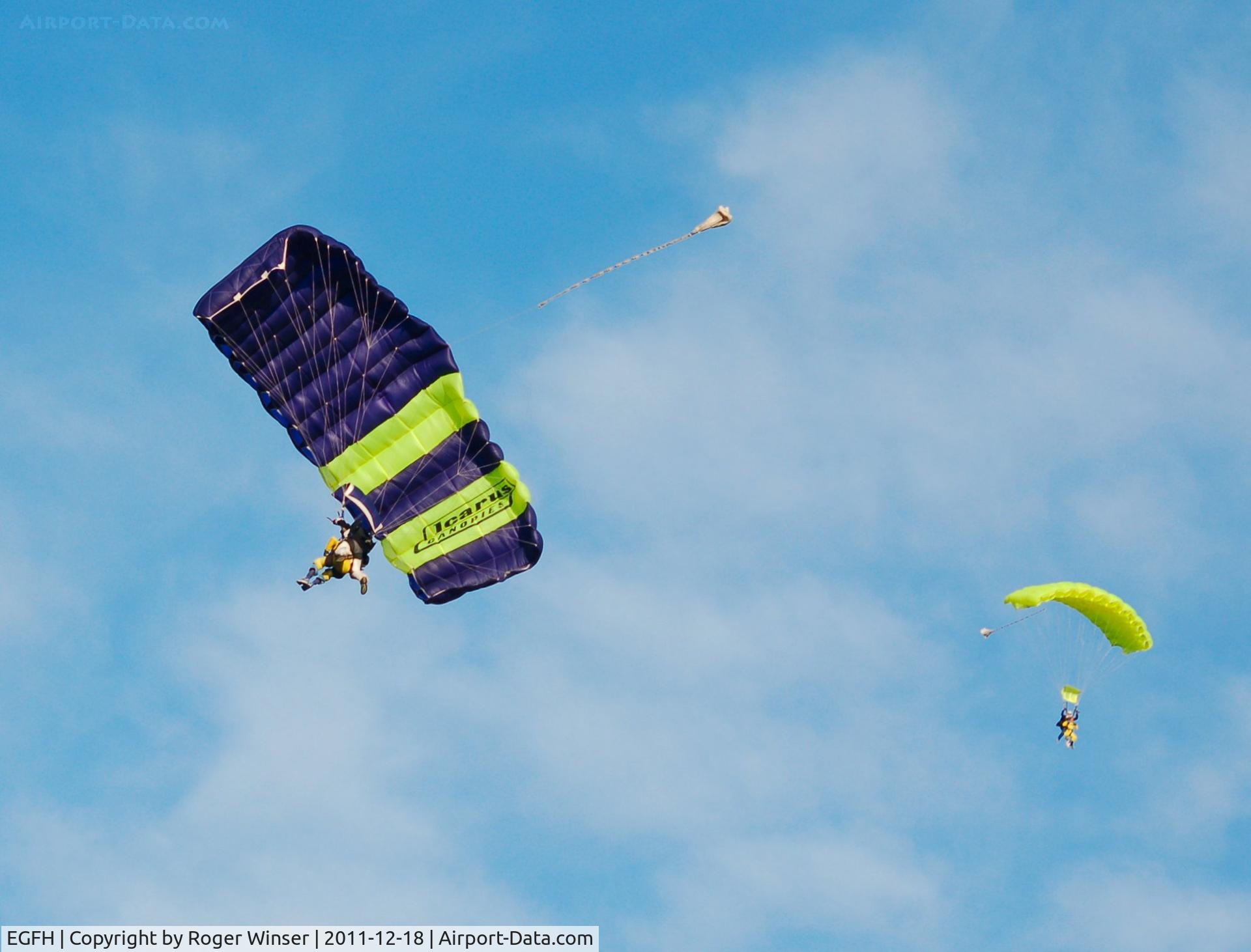 Swansea Airport, Swansea, Wales United Kingdom (EGFH) - Nice day for tandem skydiving with Skydive Swansea at Swansea Airport.