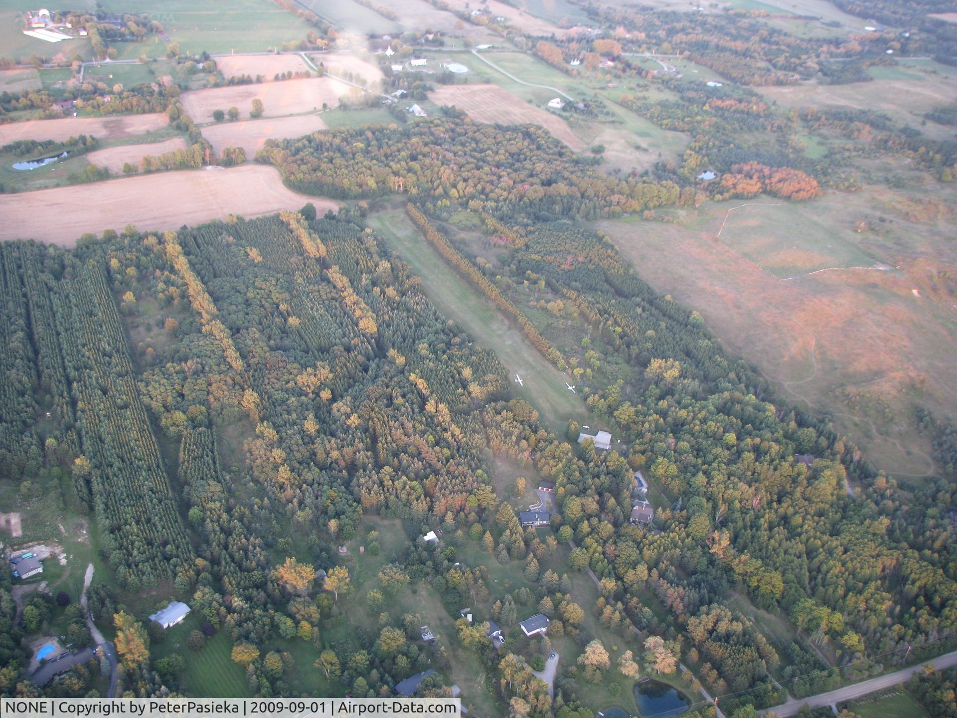 NONE Airport - Yes that is a private strip in that cutout. This runway is east of Orangevill (+-10SM) Ontario, Canada