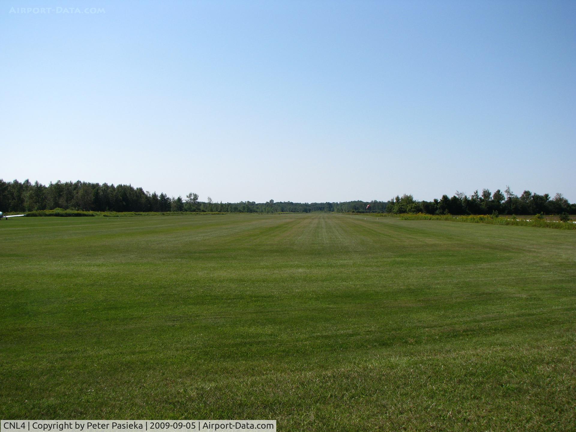 CNL4 Airport - 3800 feet long 175 feet wide perfectly kept grass runway of the Port Elgin Airport. Looking down runway 24. 